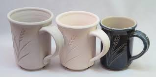 Ceramic mugs showing shrinkage examples